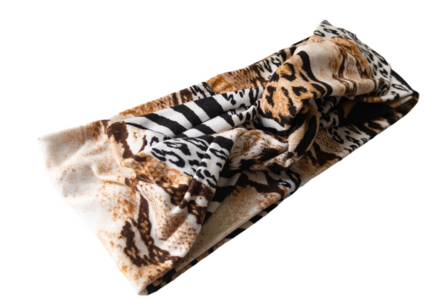 "Multi animal print headband with black, white, and blends of browns."