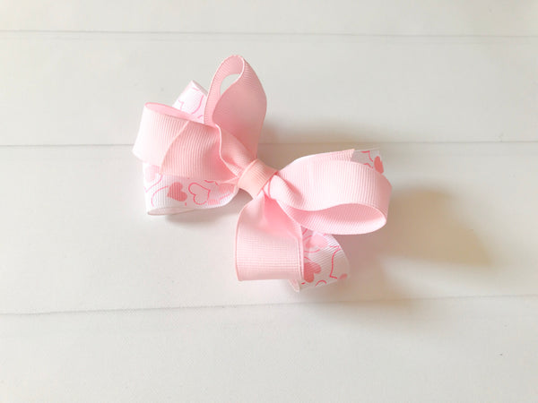 Girls Double Twisted Valentine Heart Boutique Hair Bow - The Enchanted Magnolia