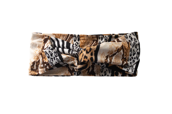 "Multi animal print headband with black, white, and blends of browns."