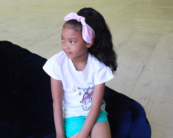 Model wearing Unicorn and Hearts Top Knot Headband-2